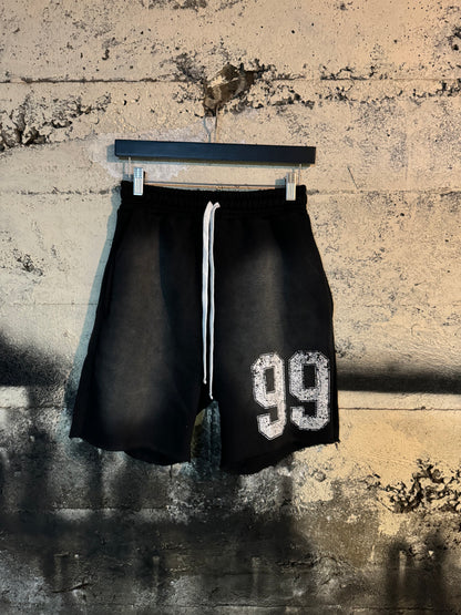 DISTRESSED 99 SWEAT SHORTS