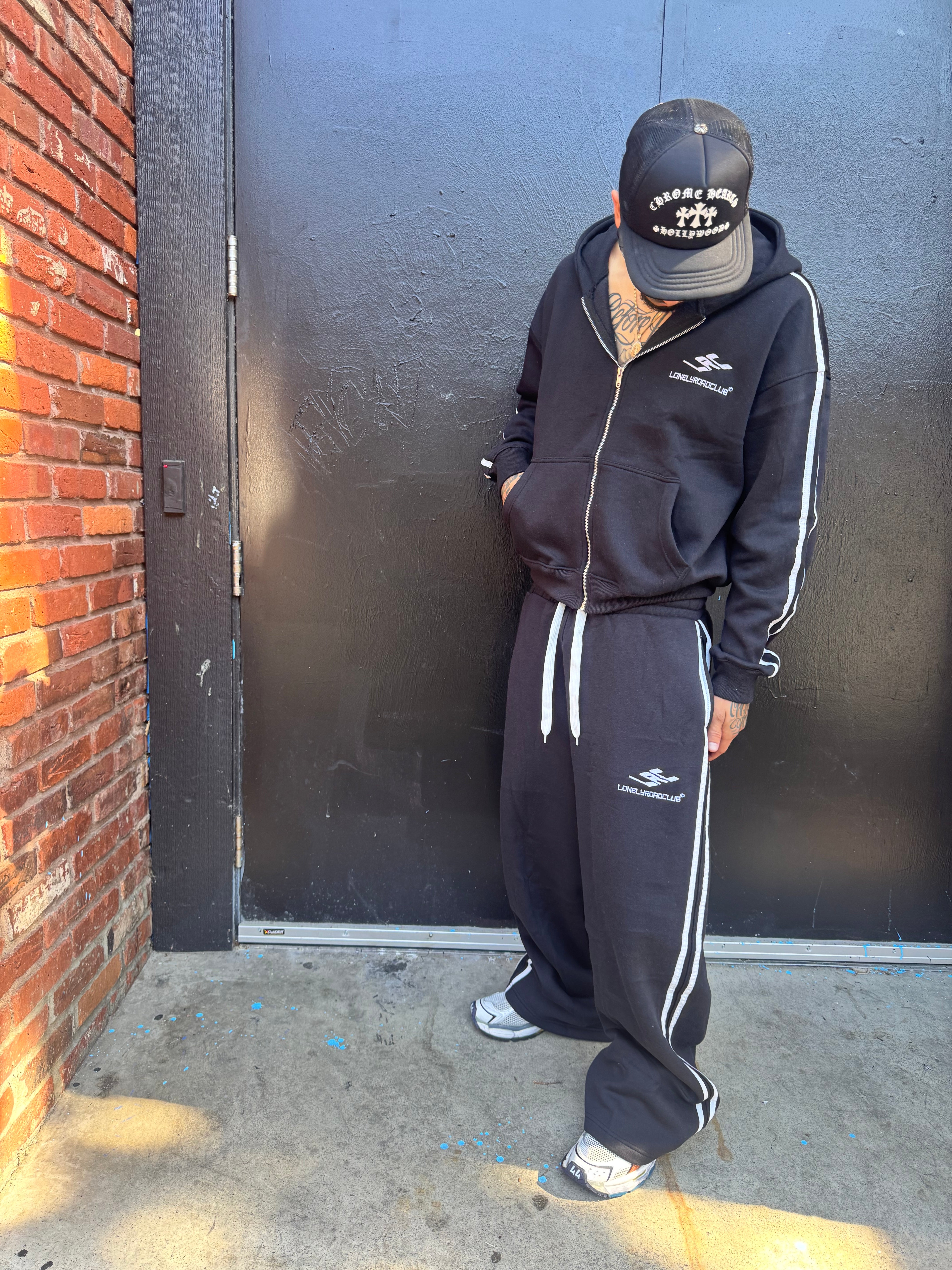 3D STRIPED BLACK SWEATPANTS