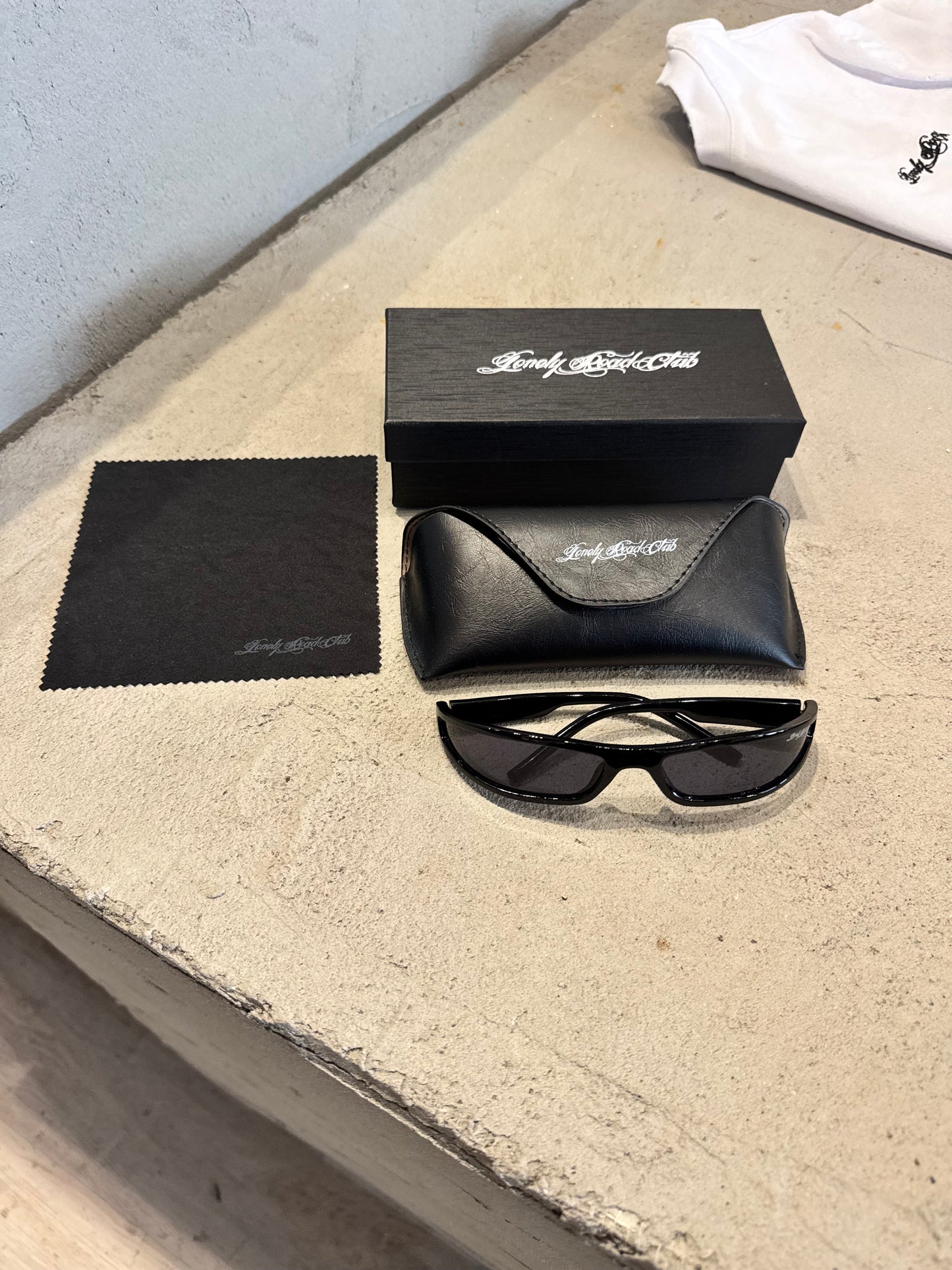 LOW CUT SUNGLASSES BLACK FRAMES WITH BLACK LENSES
