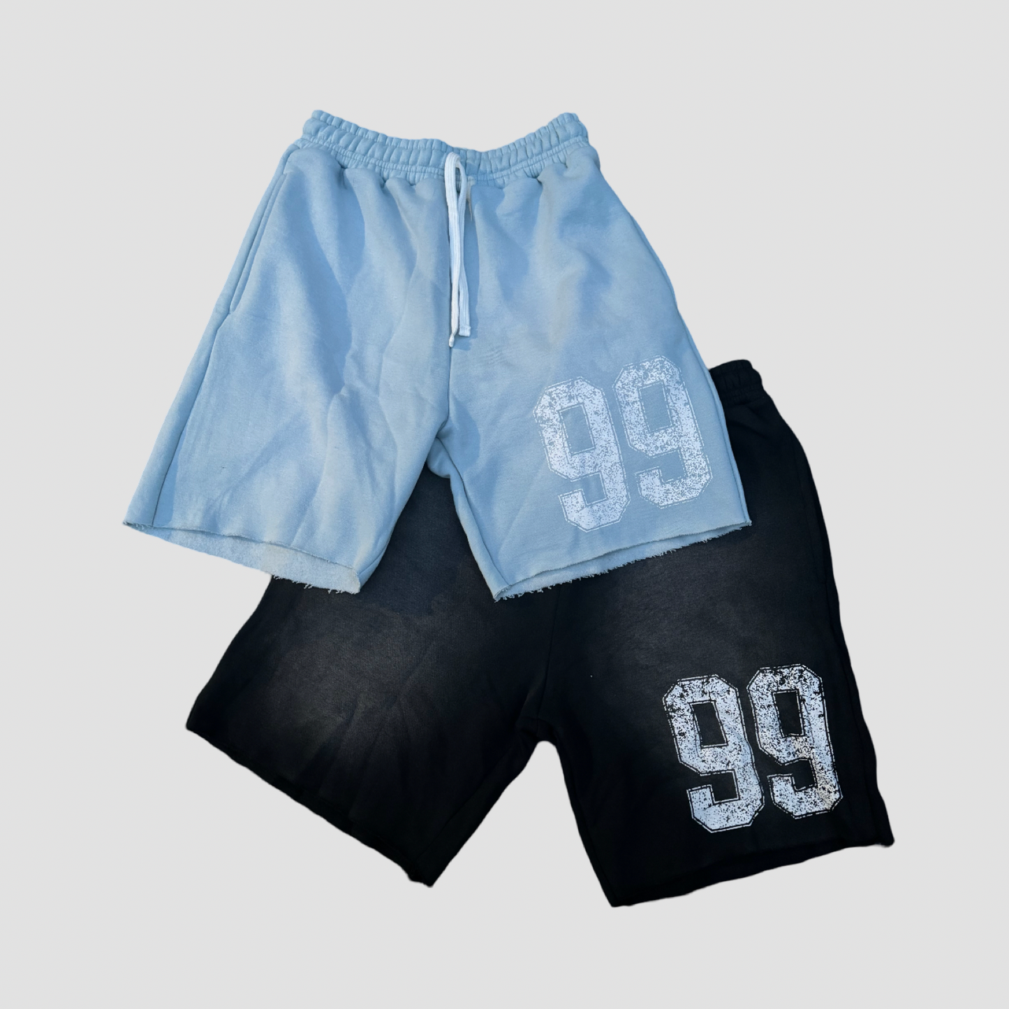 DISTRESSED 99 SWEAT SHORTS